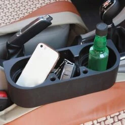Merkloos Decopatent® Autostoel Organizer - Voor Tussen Auto Stoel / Console - Bekerhouder & Telefoonhouder - Opbergvakken - Auto Organiser 16 Merkloos Decopatent® Autostoel Organizer - Voor Tussen Auto Stoel / Console - Bekerhouder & Telefoonhouder - Opbergvakken - Auto Organiser -Auto Zit Verkoop 1200x1200 591